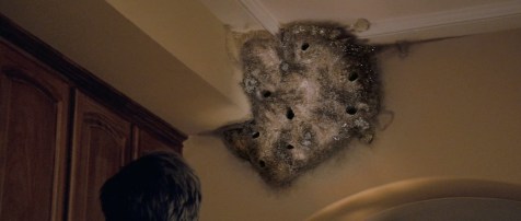 I don't think that's supernatural. Looks more like a bad case of swallows building nests in their house...
