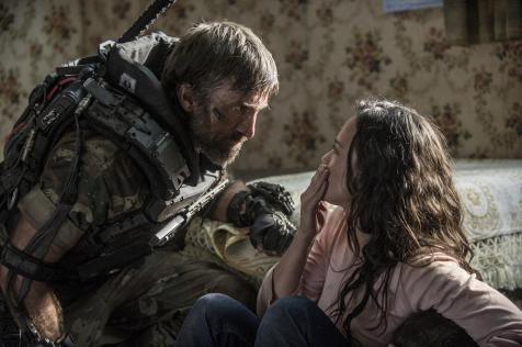 Elysium - Sharlto Copley and Alice Braga